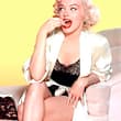 Marilyn Monroe, enjoying some sweets.