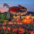 A massive glowing Ao Fish lantern, depicting a mythical Chinese creature with a…