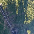 Known for its distinctive table-mountain landform, Wawu Mountain features a sum…
