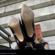 Whoever might this be? Wouldn’t she be cozier out of those sultry heels? No, mo…