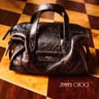 The Issy Pump's structural bow and Bar Holdall's fluid silhouette capture refin…