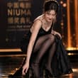 Asian star XiaoKe showed her self-designed “BWC” mismatched high heels at the a…