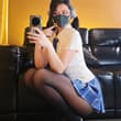 Meet Naimi奶咪 ✨ @anaimiya 冷色近拍、沙發自拍，到金色布簾前的完整造型——Naimi奶咪 的神秘感每滑一張就更明顯。 A masked…