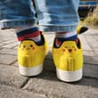 ⚡💛 Pikachu meets striped socks! 🧦👟 Yellow Pokémon sneakers + colorful socks = t…
