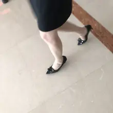 这个女同事的黑高跟，同好发来了腿照，很极品的美腿。