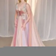 elle fanning wearing custom valentino at the academy museum gala