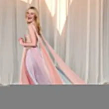 elle fanning wearing custom valentino at the academy museum gala