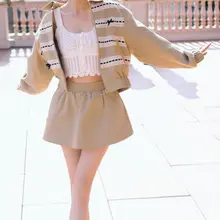 佟丽娅休闲短裙秀出笔直美腿，俏皮少女感十足